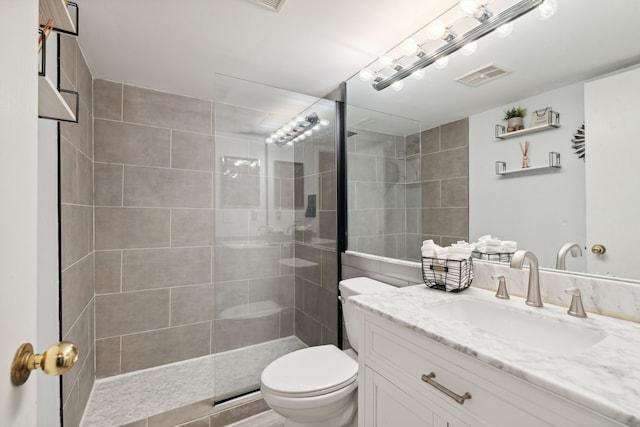 9601 Bayview Dr # 301, Ypsilanti, MI 48197 - full bath with toilet, a walk in shower, and vanity