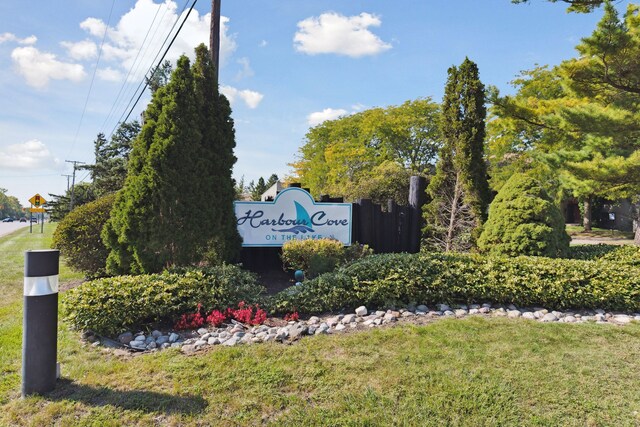 9601 Bayview Dr # 301, Ypsilanti, MI 48197 - community sign featuring a lawn