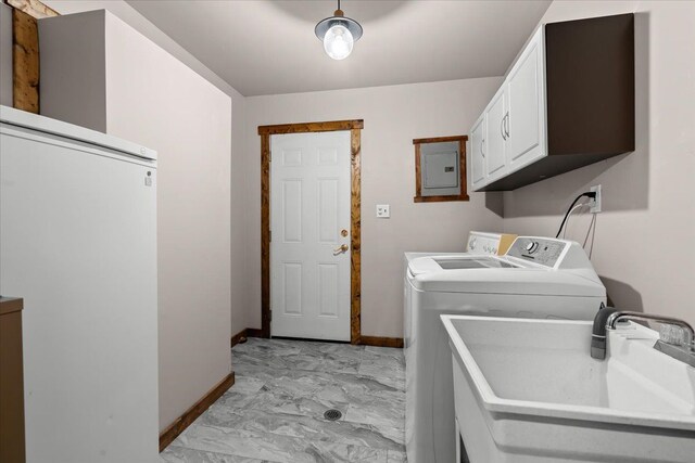 laundry room with light marble finish flooring, independent washer and dryer, baseboards, cabinet space, and electric panel