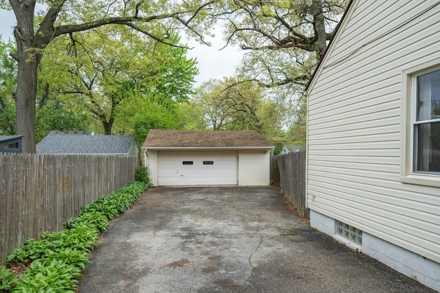 detached garage with fence