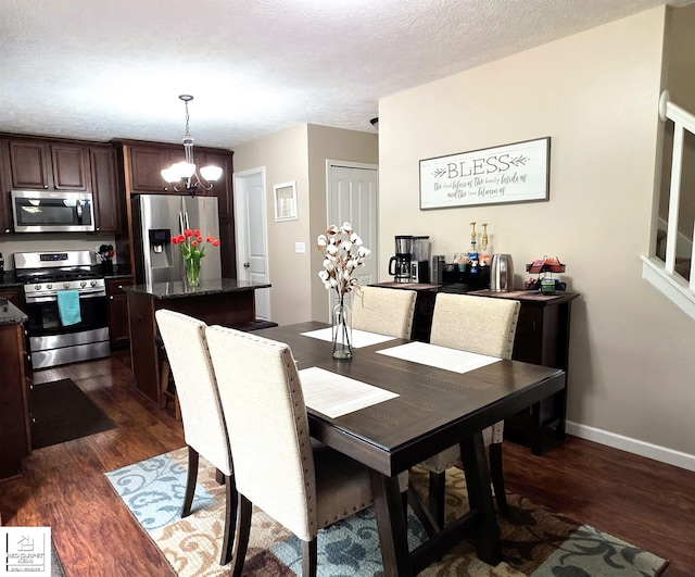 465 Edgewood Pass, Fenton, MI 48430 - dining area with dark wood-type flooring, baseboards, a textured ceiling, and a chandelier