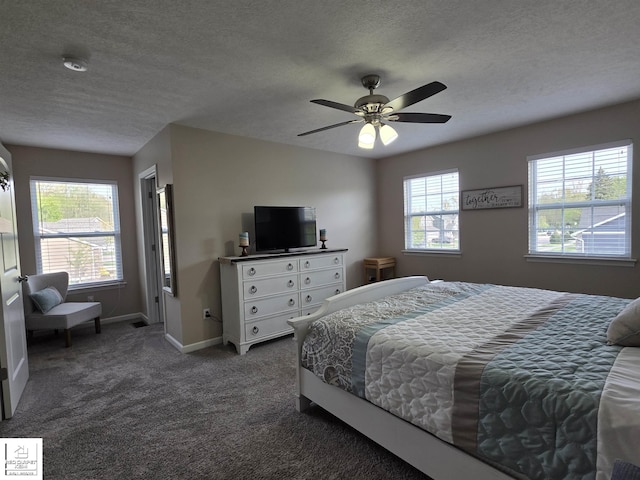 465 Edgewood Pass, Fenton, MI 48430 - bedroom featuring baseboards, carpet floors, a textured ceiling, and ceiling fan