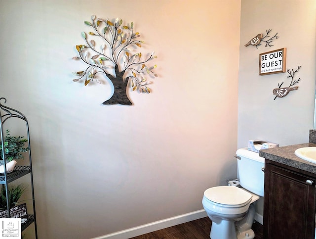 465 Edgewood Pass, Fenton, MI 48430 - half bath with baseboards, vanity, toilet, and wood finished floors