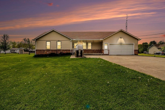 3480 S Vassar Rd, Burton, MI 48519 - view of front of property featuring brick siding, concrete driveway, a front yard, and an attached garage
