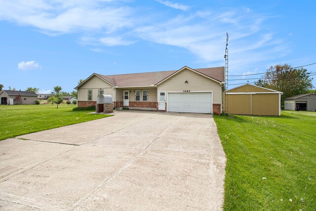 3480 S Vassar Rd, Burton, MI 48519 - ranch-style house with brick siding, an attached garage, concrete driveway, and a front yard