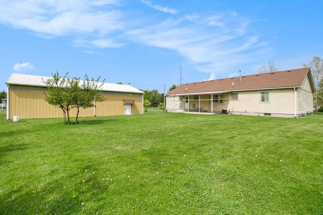 3480 S Vassar Rd, Burton, MI 48519 - view of grassy yard with an outdoor structure and a pole building