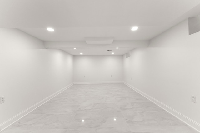 21984 Wildwood St, Dearborn, MI 48128 - finished basement featuring recessed lighting, baseboards, and light marble finish floors