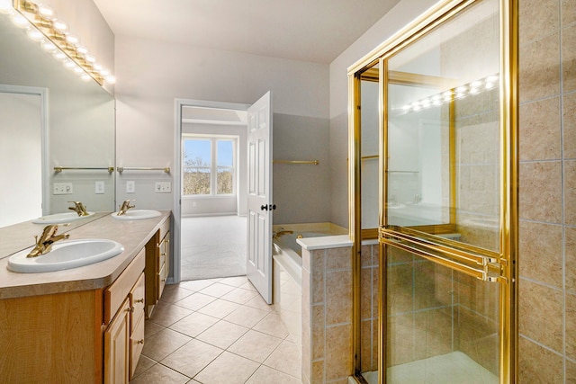 3736 Vicksburg Way, Howell, MI 48843 - bathroom with tile patterned floors, double vanity, a garden tub, and a stall shower