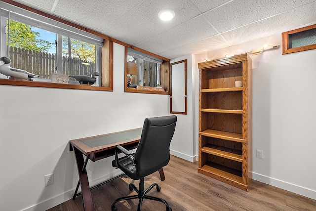 2015 Hazel Ave, Wixom, MI 48393 - office space featuring wood finished floors, baseboards, and a paneled ceiling