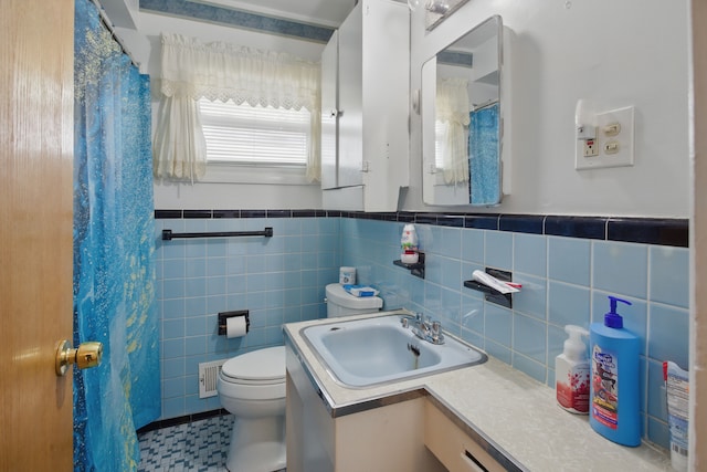 29660 Avondale St, Inkster, MI 48141 - full bathroom featuring toilet, a wainscoted wall, tile walls, vanity, and a shower with curtain