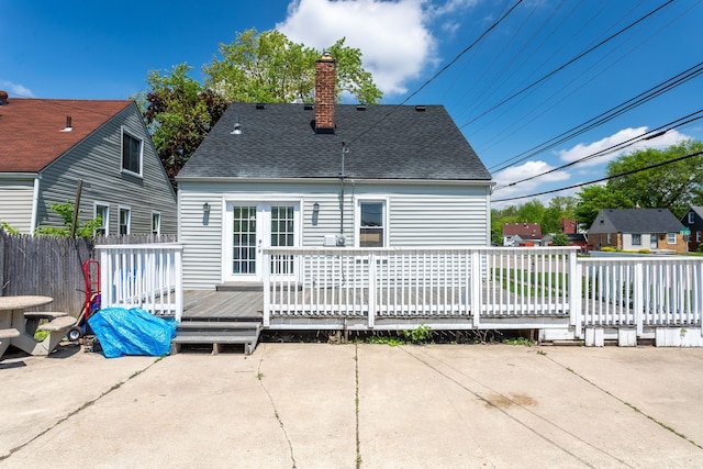 26613 W Hills Dr, Inkster, MI 48141 - rear view of property with a wooden deck, a chimney, a patio, and a shingled roof