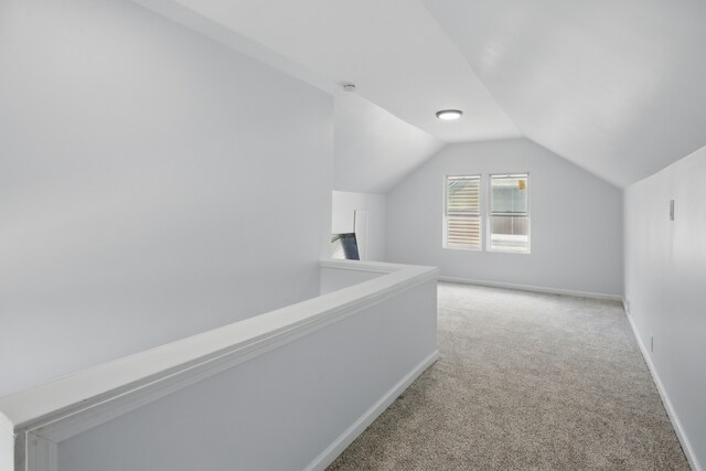 26613 W Hills Dr, Inkster, MI 48141 - additional living space featuring carpet floors, lofted ceiling, and baseboards