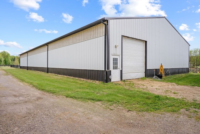 view of outbuilding with an outbuilding and driveway