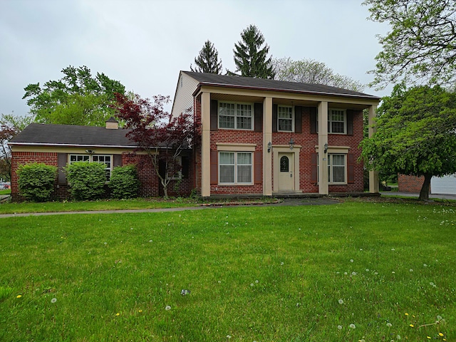 4003 Old Dominion Dr, West Bloomfield, MI 48323 - view of front of home featuring brick siding and a front lawn