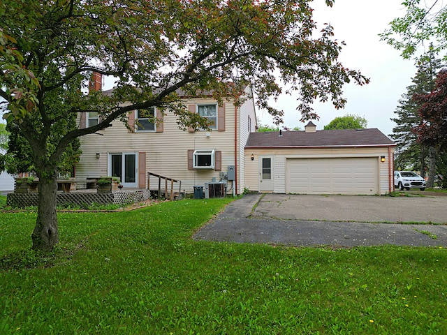 4003 Old Dominion Dr, West Bloomfield, MI 48323 - rear view of house featuring central AC unit, a yard, and driveway