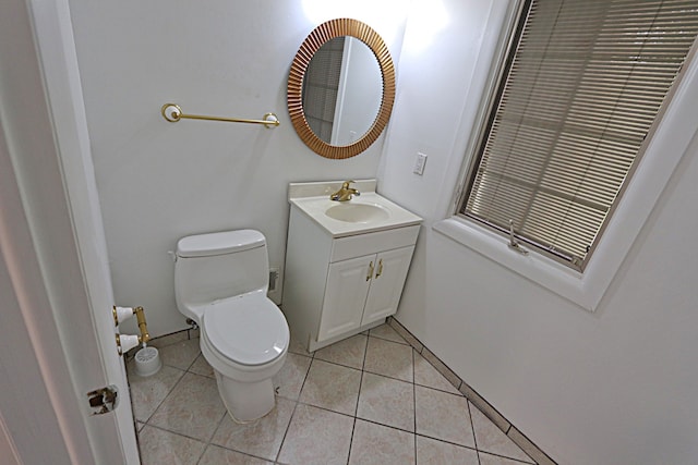 4003 Old Dominion Dr, West Bloomfield, MI 48323 - bathroom with toilet, tile patterned floors, and vanity