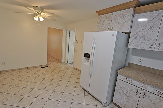 4003 Old Dominion Dr, West Bloomfield, MI 48323 - kitchen with white fridge with ice dispenser, ceiling fan, and light tile patterned flooring