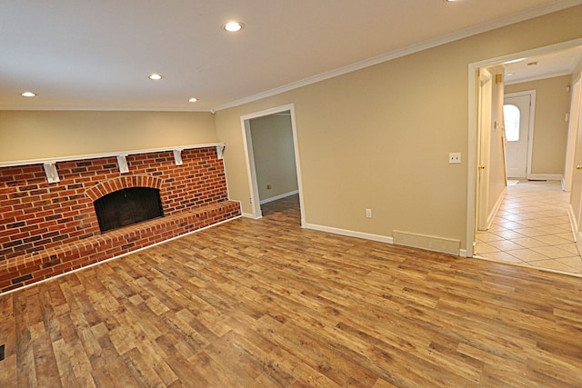 4003 Old Dominion Dr, West Bloomfield, MI 48323 - unfurnished living room featuring wood finished floors, recessed lighting, ornamental molding, baseboards, and a fireplace