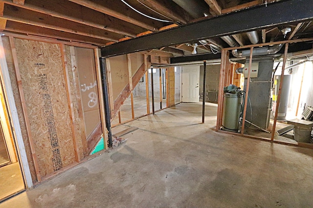 4003 Old Dominion Dr, West Bloomfield, MI 48323 - unfinished basement featuring gas water heater and a water softener
