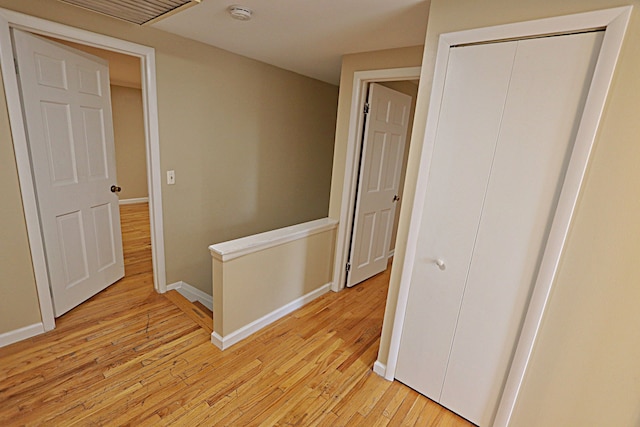 4003 Old Dominion Dr, West Bloomfield, MI 48323 - corridor with light wood finished floors, baseboards, and an upstairs landing