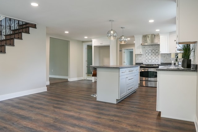 278 W Saint Clair St, Romeo, MI 48065 - kitchen with electric range, wall chimney range hood, dark countertops, baseboards, and white cabinets