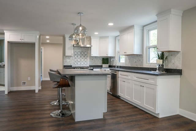 278 W Saint Clair St, Romeo, MI 48065 - kitchen featuring dishwasher, dark countertops, white cabinetry, and recessed lighting