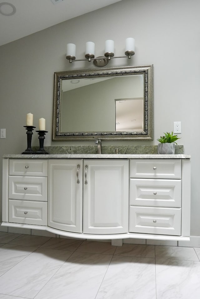 278 W Saint Clair St, Romeo, MI 48065 - bathroom featuring marble finish floors and vanity