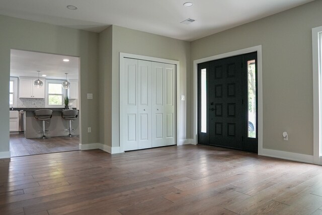 278 W Saint Clair St, Romeo, MI 48065 - entrance foyer with wood finished floors, baseboards, and recessed lighting