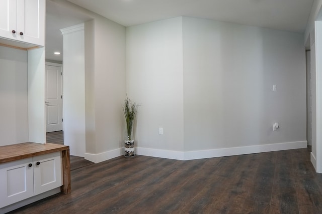278 W Saint Clair St, Romeo, MI 48065 - empty room with dark wood finished floors, baseboards, and recessed lighting