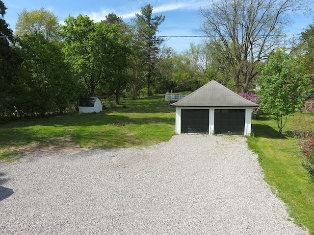 278 W Saint Clair St, Romeo, MI 48065 - detached garage with view of wooded area
