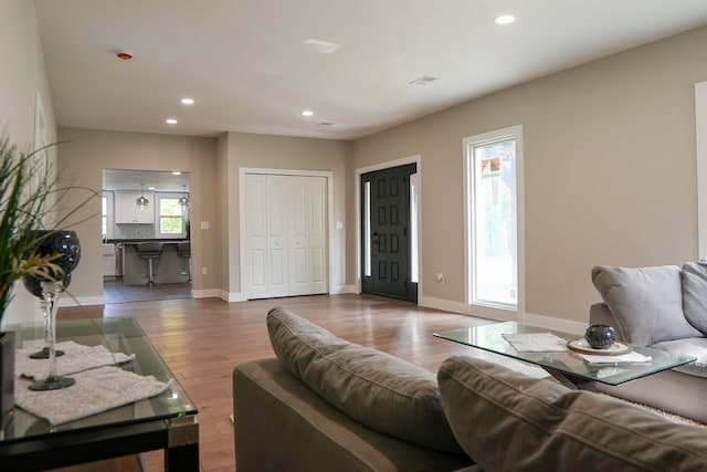 278 W Saint Clair St, Romeo, MI 48065 - living area featuring recessed lighting, wood finished floors, and baseboards