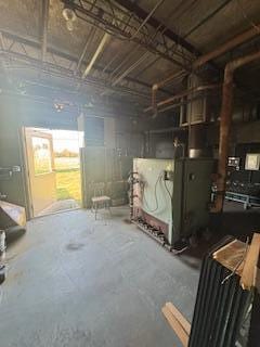 2251 W Jackson Rd, Hart, MI 49420 - miscellaneous room featuring concrete flooring