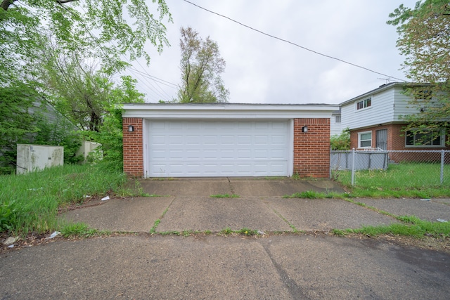 detached garage with fence