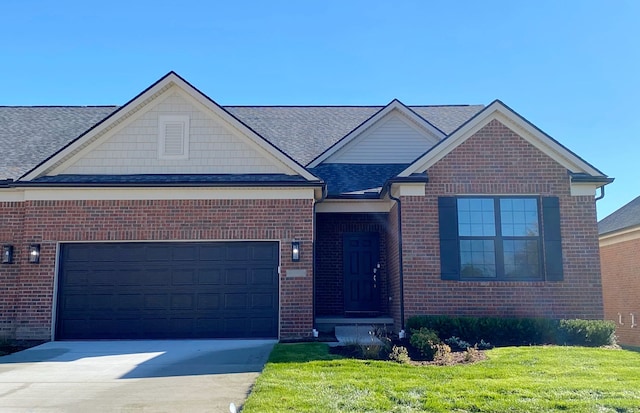 55697 Oak Pointe Dr, Utica, MI 48315 - view of front of home with concrete driveway, an attached garage, roof with shingles, a front yard, and brick siding