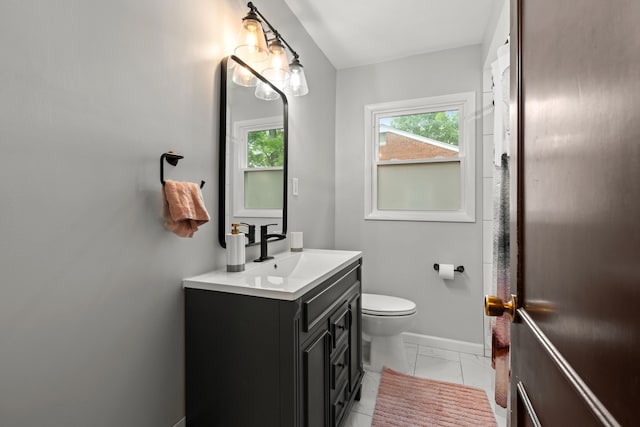 bathroom featuring baseboards, marble finish flooring, toilet, and vanity