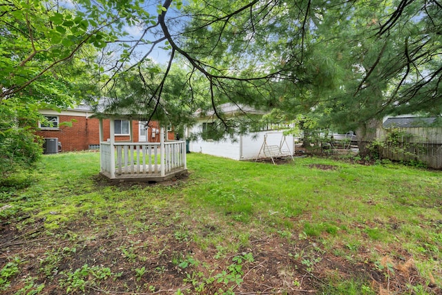 view of yard with central AC unit