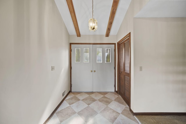 216 Wickenham Dr, Spring Arbor, MI 49283 - foyer entrance featuring a chandelier, beamed ceiling, and baseboards