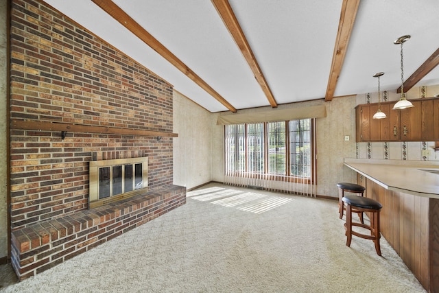 216 Wickenham Dr, Spring Arbor, MI 49283 - living area with a brick fireplace, carpet floors, beam ceiling, and baseboards