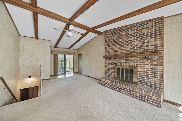 216 Wickenham Dr, Spring Arbor, MI 49283 - unfurnished living room featuring carpet, beamed ceiling, ceiling fan, a brick fireplace, and high vaulted ceiling