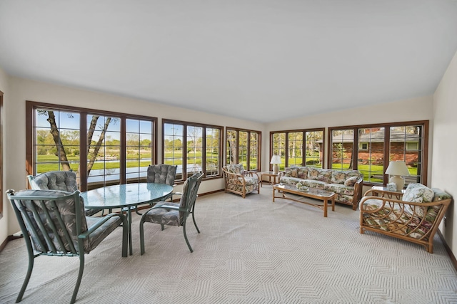 216 Wickenham Dr, Spring Arbor, MI 49283 - sunroom / solarium featuring vaulted ceiling, plenty of natural light, and baseboards