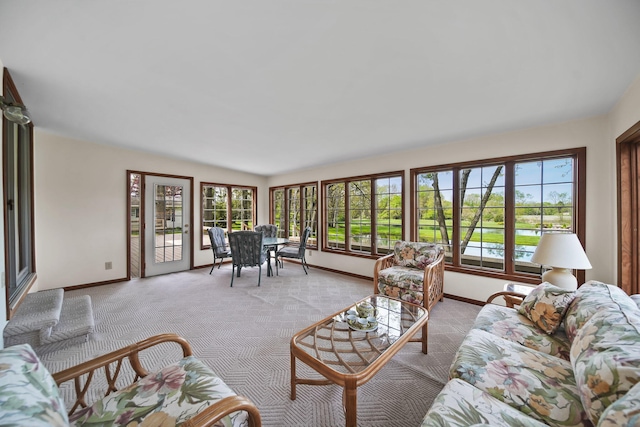 216 Wickenham Dr, Spring Arbor, MI 49283 - living area featuring baseboards and light colored carpet