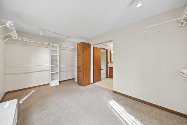 216 Wickenham Dr, Spring Arbor, MI 49283 - spacious closet featuring light colored carpet