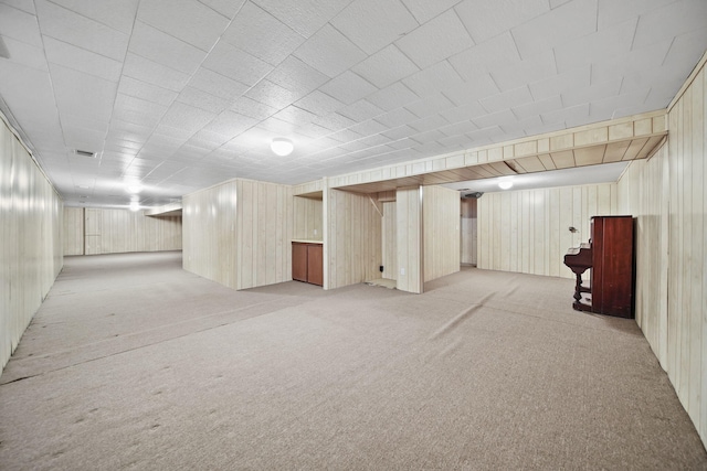 216 Wickenham Dr, Spring Arbor, MI 49283 - finished below grade area featuring light colored carpet and wooden walls