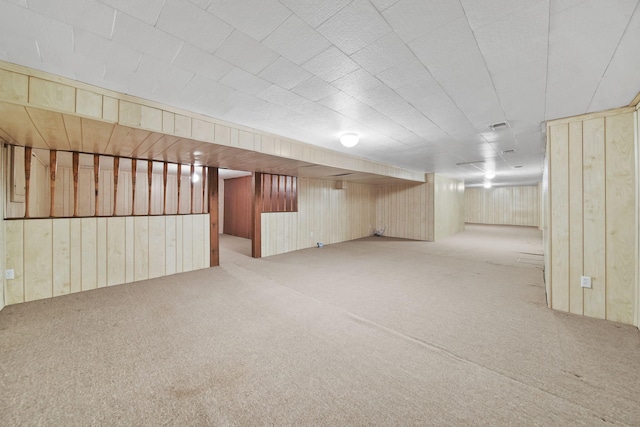 216 Wickenham Dr, Spring Arbor, MI 49283 - finished below grade area with carpet flooring and wood walls