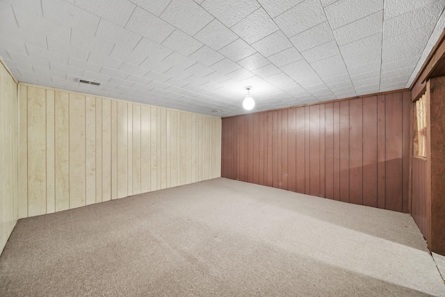 216 Wickenham Dr, Spring Arbor, MI 49283 - finished below grade area featuring carpet flooring and wooden walls