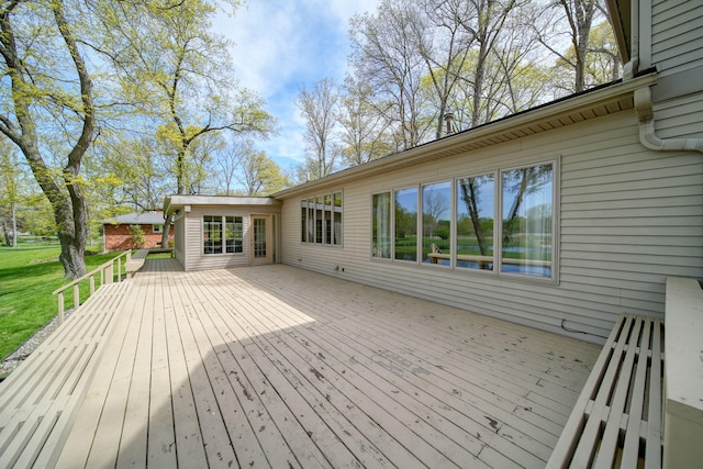 216 Wickenham Dr, Spring Arbor, MI 49283 - wooden deck with a water view