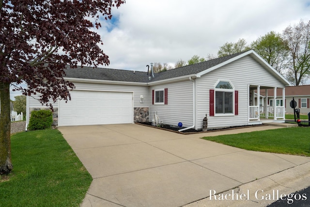 view of front facade with an attached garage, driveway, a front yard, a porch, and a shingled roof