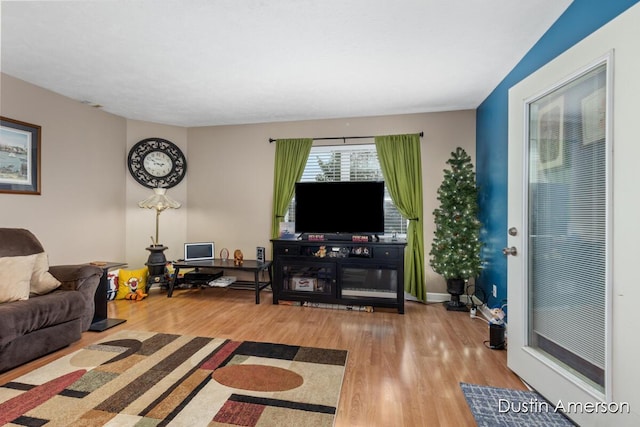 8485 E Center Park Dr SW Unit 18, Byron Center, MI 49315 - living area with wood finished floors