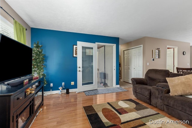 8485 E Center Park Dr SW Unit 18, Byron Center, MI 49315 - living area with wood finished floors and baseboards
