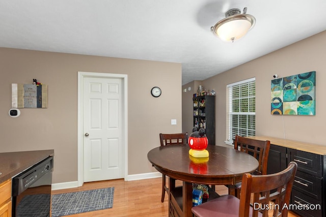 8485 E Center Park Dr SW Unit 18, Byron Center, MI 49315 - dining space featuring light wood finished floors and baseboards